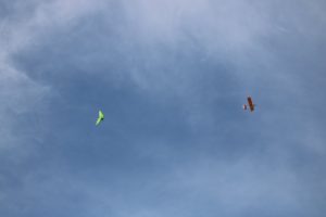 plane and hang glider flying